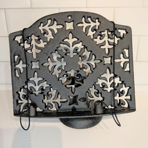 Ornate black cast metal - ornate,