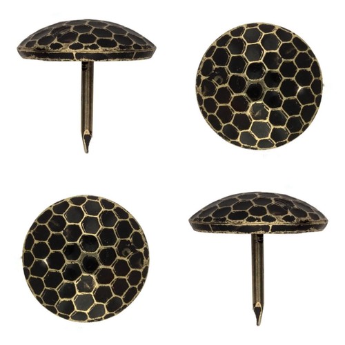 Upholstery nails hammered - -,