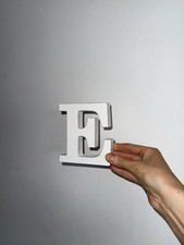 white wooden letter ‘E’