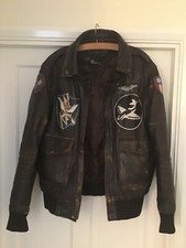 WW2 USAAF A2 “Flying Tigers” flight jacket including boots and Officer’s uniform