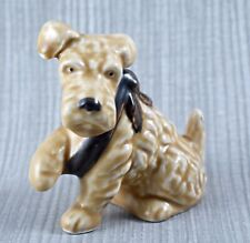 VINTAGE SYLVAC DOG WITH PAW IN