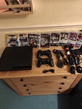 Sony PlayStation 3 Slim 250GB Console Bundle W/8 Games