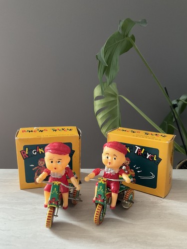 Two vintage tin wind - two,