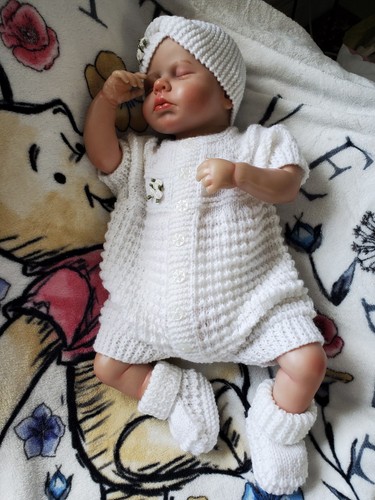 Hand knitted newborn - hand,