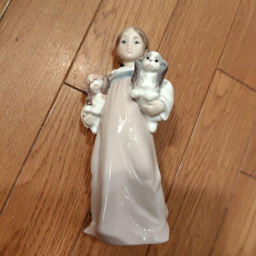 Lladro ornament girl and - ornament, dog