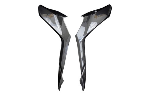 Carbon side panels below seat - side,