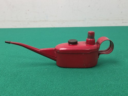 Red pump action oiler - action,