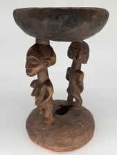 A YORUBA FIGURAL STOOL, NIGERIA, EARLY 20th CENTURY