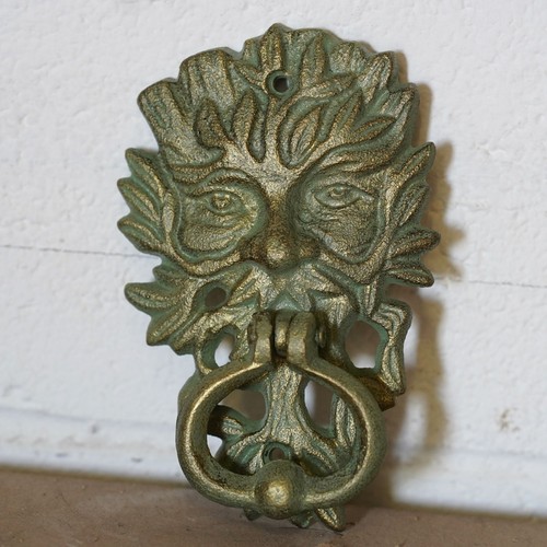 Cast iron green man door - iron,