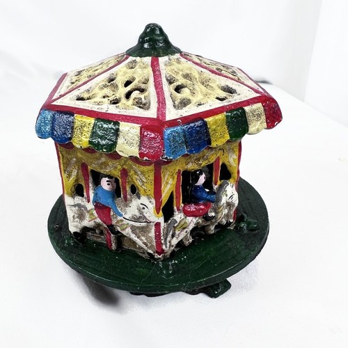 Antique cast iron carousel - cast,