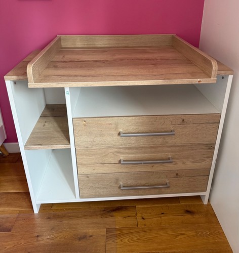 Wooden chest drawer with baby