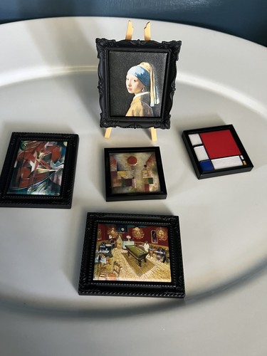 Paintings and stand - 5,