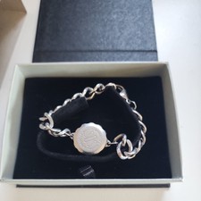 Silver tone SOS Talisman