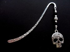 A TIBETAN SILVER SKULL BOOKMARK. CHOICE OF COLOURS. NEW. 9CM.