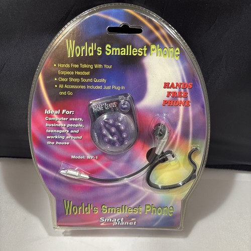 World smallest phone hand s - world's, hand's