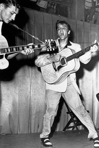 Elvis presley performs with - performs,