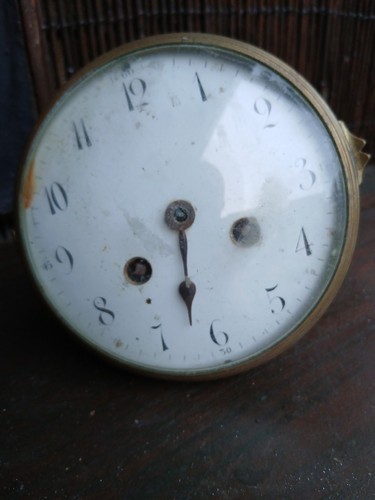 Old clock movement and - movement, dial