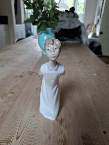 Lladro white pircelain boy - lladro,