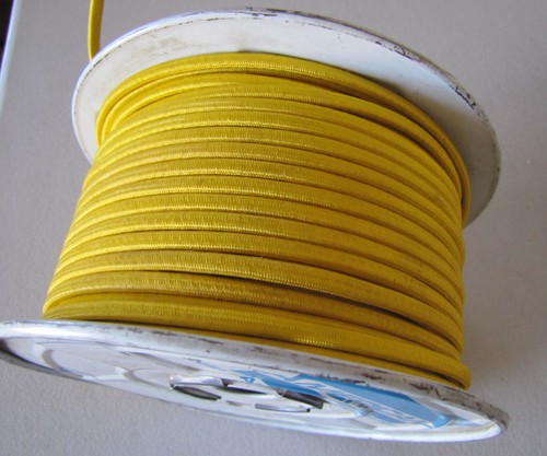 Bright gold cloth wire rockola - wire,