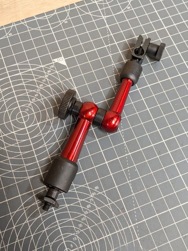 Small articulated arm - -, dial