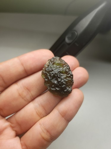 Moldavite with deep texture - with,