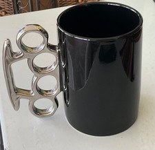 Knuckle duster coffee mug