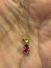 9 Carat Gold Ruby Pendant &