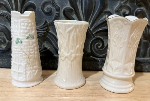 Three small belleek vases - three,