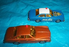 Corgi Junior Kojack Buick car and Metropolis Police Buick from Superman