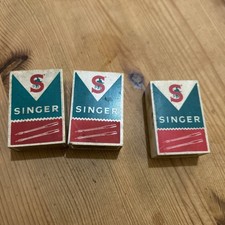 3 Boxes of Singer Sewing