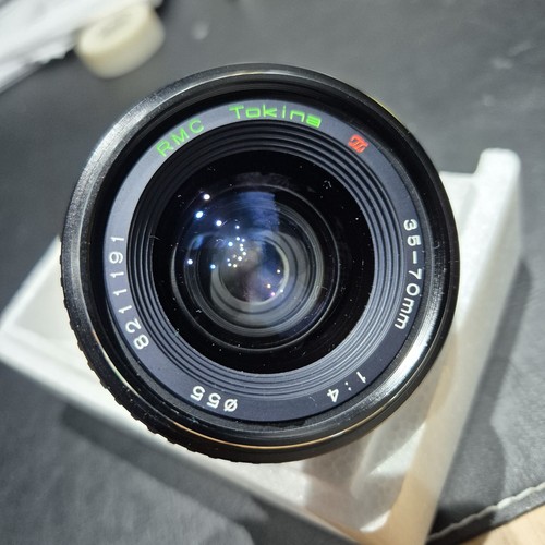 Tokina 70mm zoom lens - f4-22,