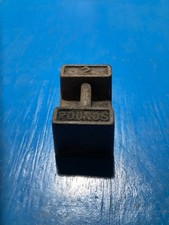 CAST IRON TWO POUNDS WEIGHT
