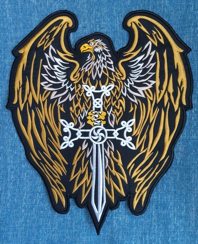 Large gold eagle clutching - eagle,