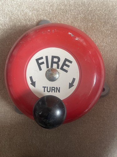 Vintage hand cranked fire bell - hand,