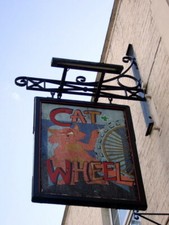 Photo 6x4 Cat and Wheel pub