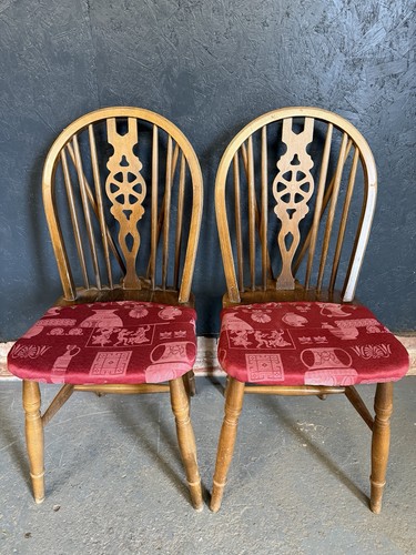 Two dining chairs wheel back - two,