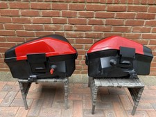 A PAIR OF DUCATI PANNIERS FROM A 2012 DUCATI MULTISTRADA 1200S