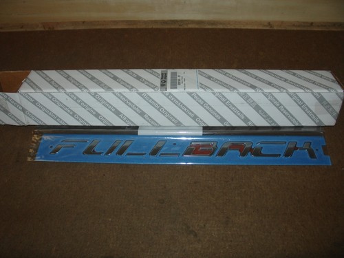 6000610642 rear badge emblem - rear,