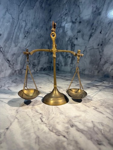 Brass scales justice made - of,
