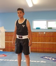 Boxing shorts set Black & White made of polyester satin. With breathable vest.