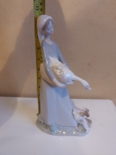 Lladro girl with goose - and, dog