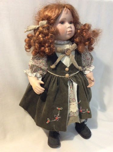 Porcelain doll on - 19”,