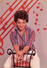 American singer Connie Francis sitting a chair with musical notes - Old Photo