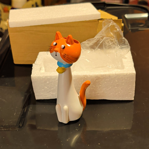 Orange white cat ceramic - &,