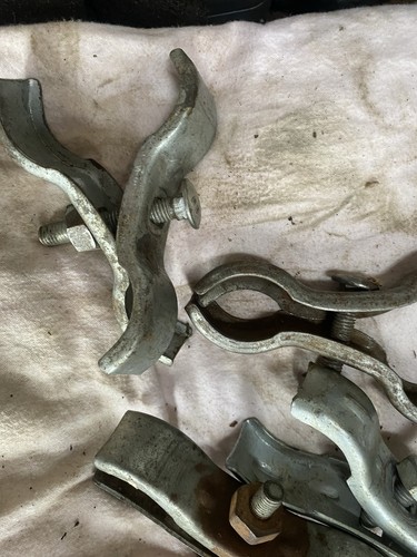 Six used heras fence clamps - six,
