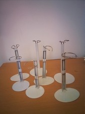 Adjustable White Metal Doll