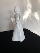 Pretty as a Picture Bone China Figurine from Coalport Moments collection. 2000
