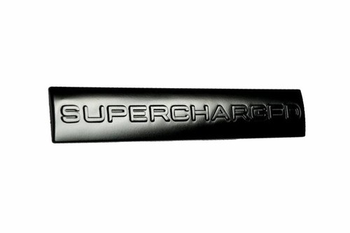 Black supercharged emblem - emblem,
