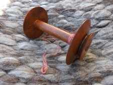 Haldane spinning wheel bobbin