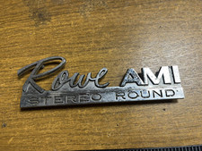 ROWE AMI STEREO ROUND CHROME BADGE FOR VINYL JUKEBOX.